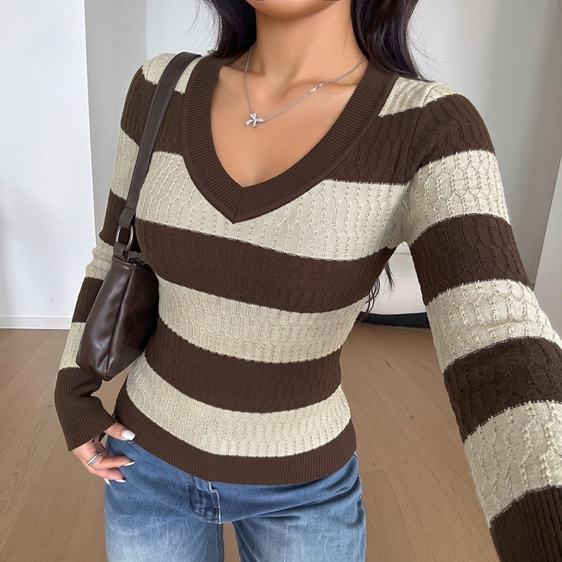 Striped long sleeved waist cinching sweater for women
