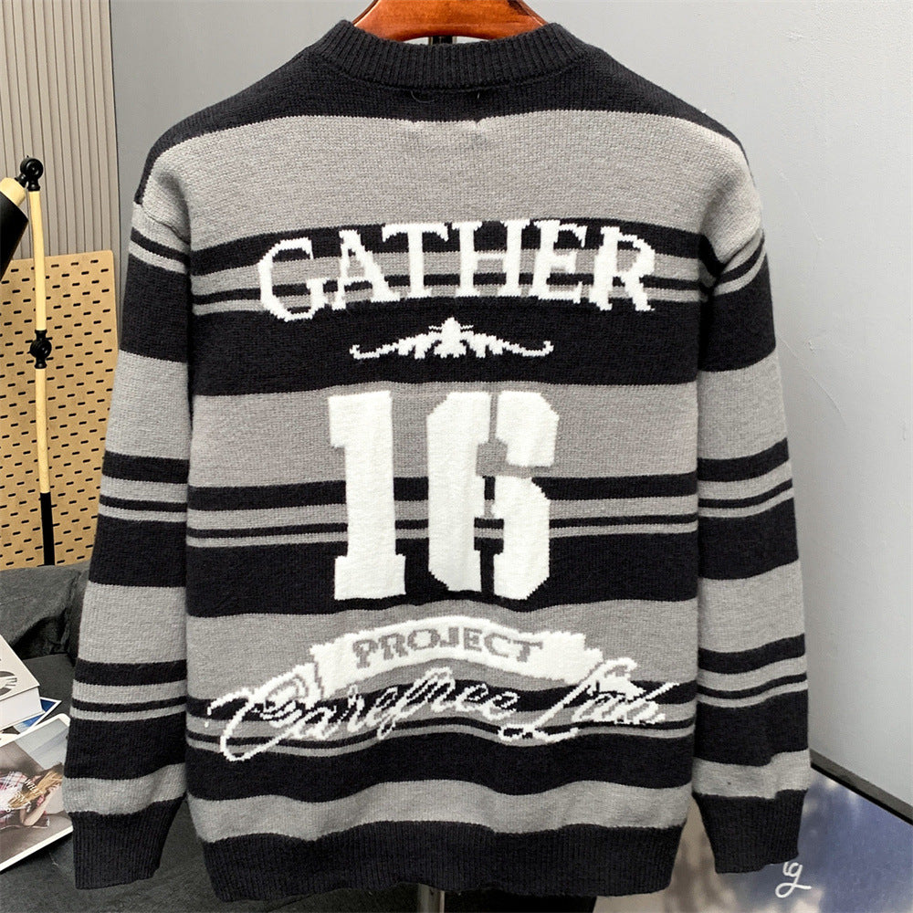 Loose round neck sweater with contrasting stripes