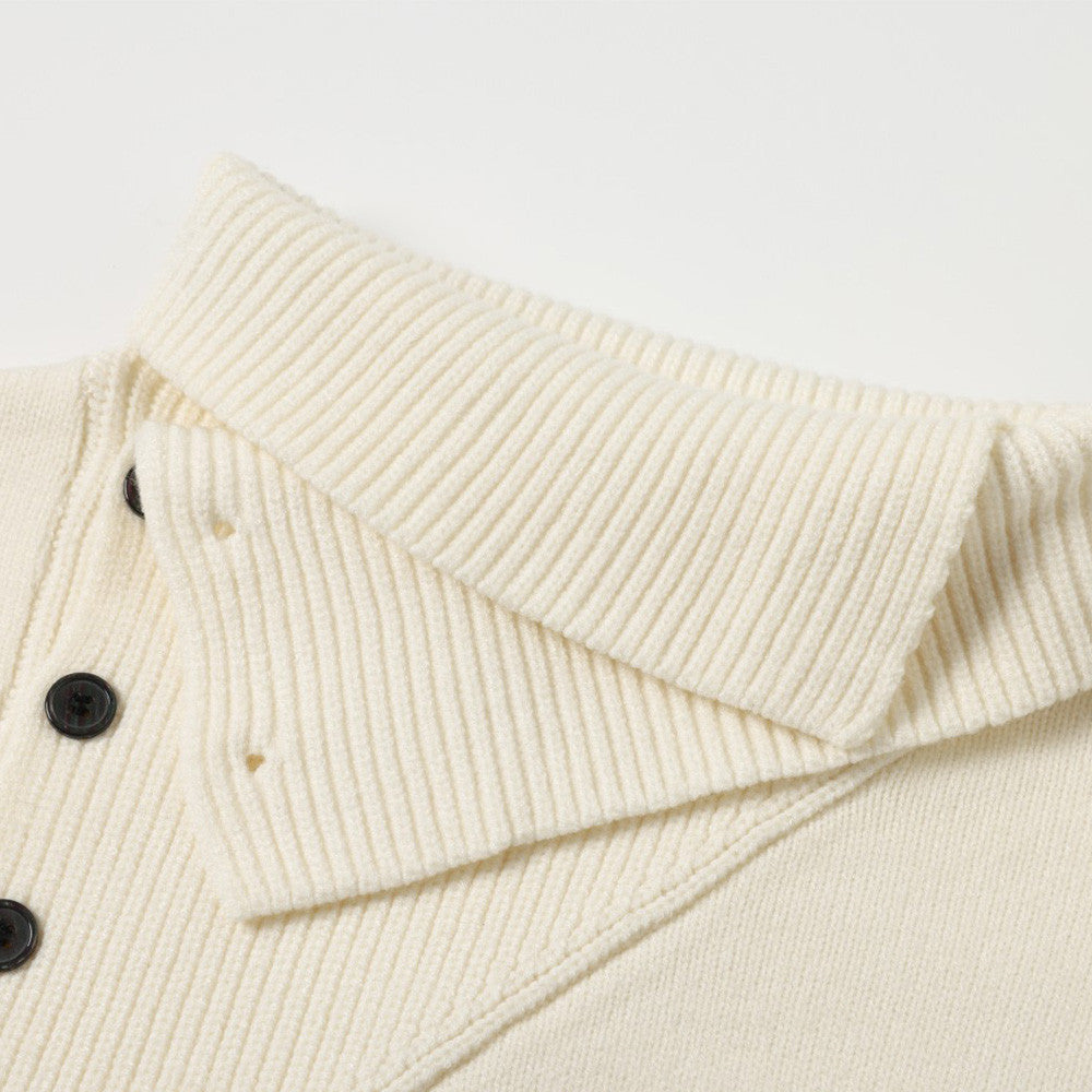 Oblique button high neck knitted sweater